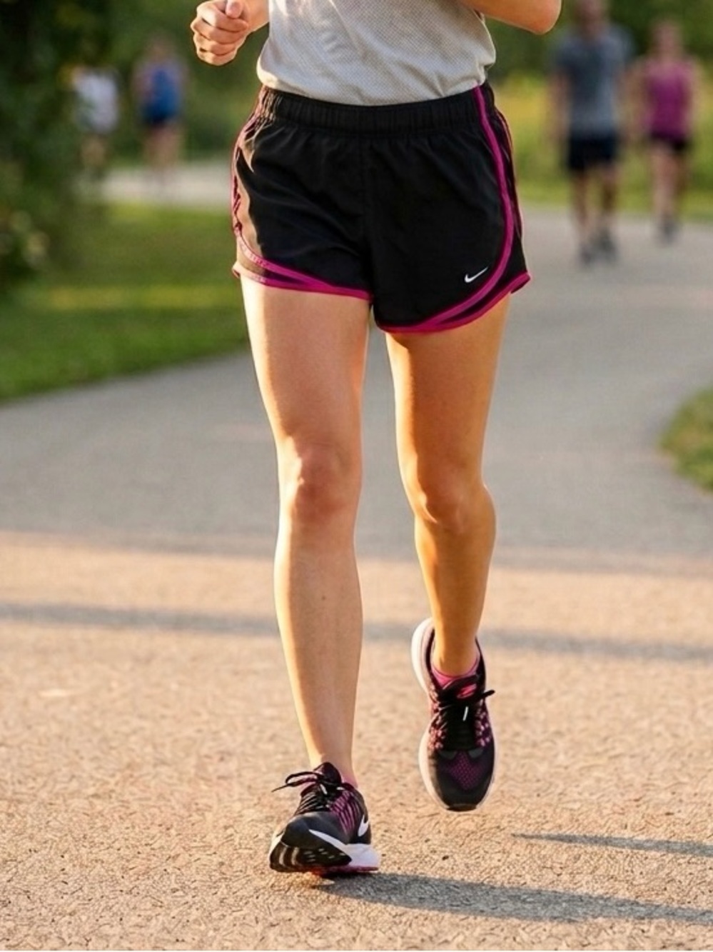 Nike Women’s Black Athletic Shorts with Pink Trim